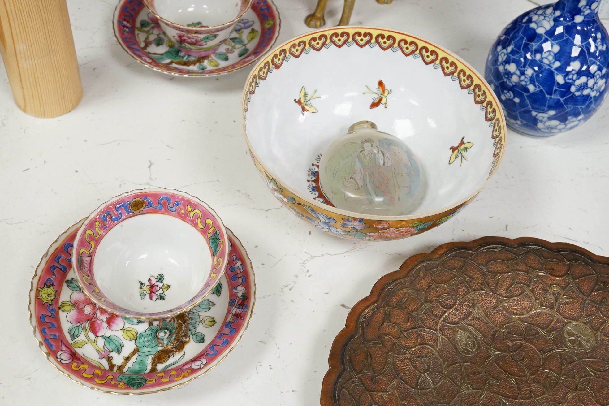 A group of mixed oriental porcelain and metalware to include a Japanese satsuma vase, cinnabar lacquer vase and blue and white teapot, largest 32cm high.